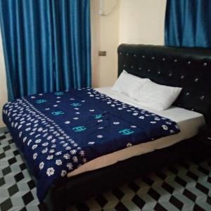 Postel nebo postele na pokoji v ubytování Funkytee Hotel & Apartment