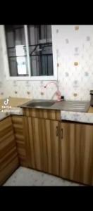 Kuchyň nebo kuchyňský kout v ubytování Funkytee Hotel & Apartment