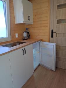 Кухня или кухненски бокс в Mobile Tinyhouse 2 by Wolfsberger