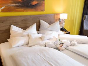 Voodi või voodid majutusasutuse DAS SIEBEN - Adults Only toas