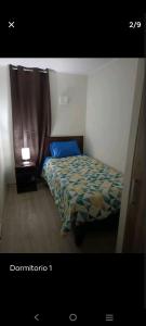 Ein Bett oder Betten in einem Zimmer der Unterkunft Habitaciones en Departamento Centro de Chillan