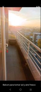 d'un balcon offrant une vue sur la ville. dans l'établissement Habitaciones en Departamento Centro de Chillan, à Chillán