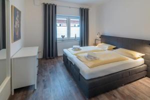 Postel nebo postele na pokoji v ubytování Traum Wohnung 1