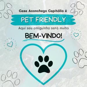 a picture of a heart with a paw print at Apto Aconchego Capitólio in Capitólio