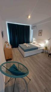 Posteľ alebo postele v izbe v ubytovaní Unique Experience Apartment’s