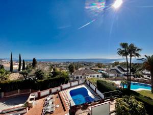 arial view of a house with a swimming pool at Villa Yolanda del Mar in Arroyo de la Miel