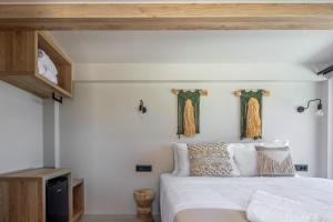 Postel nebo postele na pokoji v ubytování Troia Villas