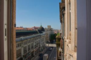 a view of a city street from a building at Bolhão Nobre Apartments in Porto