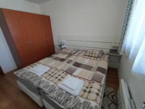 A bed or beds in a room at New Inn