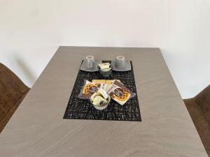 a table with two plates of food on it at LA SCALINATA in Portoferraio