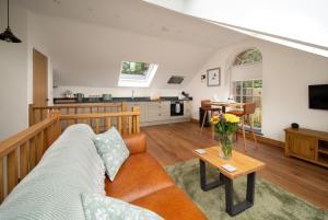 Et opholdsområde på Poppy's Barn + 30 billeder