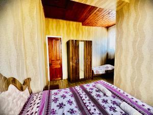 Voodi või voodid majutusasutuse Guesthouse Kamelia toas