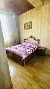 Voodi või voodid majutusasutuse Guesthouse Kamelia toas