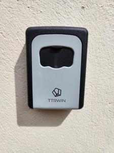 a white and black electrical outlet on a wall at Curry Mallet Cottages in Taunton