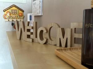 a sign that says the word mercy on a table at Casa Montessori in Avezzano