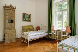 En eller flere senge i et værelse på Apartment Anna