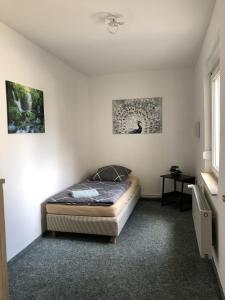 Voodi või voodid majutusasutuse BIG Apartment - 150qm in Bad Liebenwerda toas