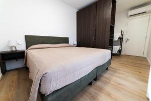 Postel nebo postele na pokoji v ubytování Castelli del Chianti