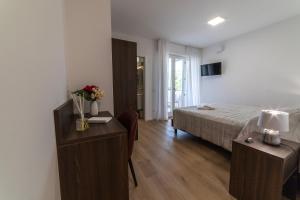 Postel nebo postele na pokoji v ubytování Castelli del Chianti