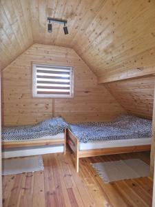 Postel nebo postele na pokoji v ubytování Agroturystyka Skoszewo