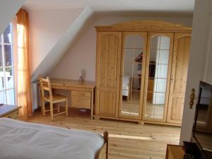 En eller flere senge i et værelse på Giebelreihenhaus Dora - Sylt, Westerland