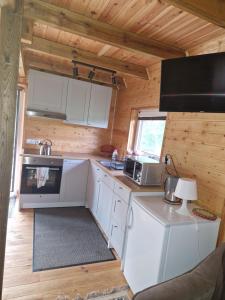 Kuchyň nebo kuchyňský kout v ubytování Agroturystyka Skoszewo