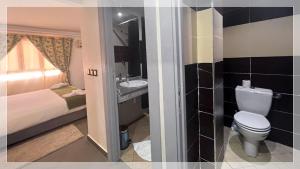 Salle de bains dans l'établissement Hotel Al Massira