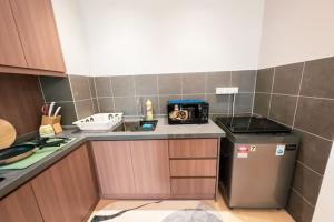 Kuchyň nebo kuchyňský kout v ubytování Netizen Cozy Suite By GUESTONIC