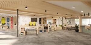 a large room with tables and chairs in it at Field Station Joshua Tree in Yucca Valley