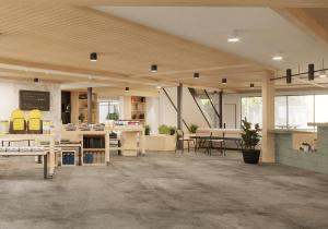a large room with a classroom with tables and chairs at Field Station Joshua Tree in Yucca Valley