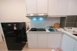 Kuchyň nebo kuchyňský kout v ubytování Netizen Cozy Suite By GUESTONIC