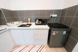 Kuchyň nebo kuchyňský kout v ubytování Netizen Cozy Suite By GUESTONIC