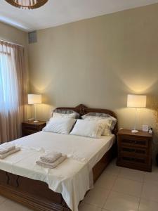 Ένα ή περισσότερα κρεβάτια σε δωμάτιο στο la PADINI CASA sul mare