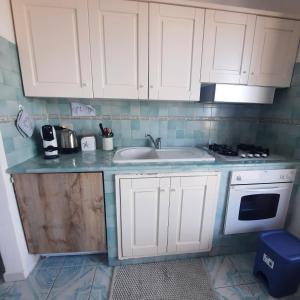 A kitchen or kitchenette at "CASA SUNSET"