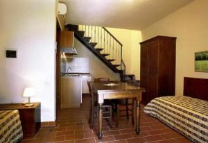 Kuchyň nebo kuchyňský kout v ubytování Hotel Borgo degli Olivi