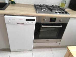 Kuchnia lub aneks kuchenny w obiekcie Apartament Centrum