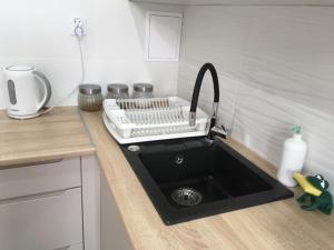Kuchnia lub aneks kuchenny w obiekcie Apartament Centrum