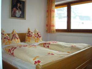 Postel nebo postele na pokoji v ubytování Gästehaus-Pension Bendler