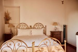 Ένα ή περισσότερα κρεβάτια σε δωμάτιο στο Il Torrione del Trebbia