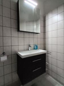 Kamar mandi di Voll ausgestattetes Apartment