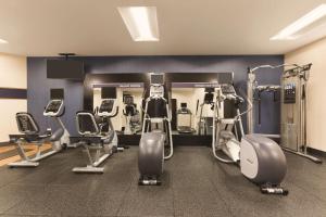 a gym with several treadmills and cardio machines at Hampton Inn Chicago Downtown/N Loop/Michigan Ave in Chicago