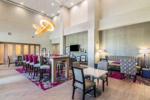 a dining room with a long table and chairs at Hampton Inn & Suites-Dallas/Richardson in Richardson