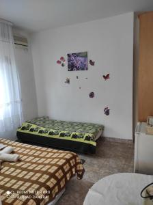 Postel nebo postele na pokoji v ubytování Guesthouse PLANINA