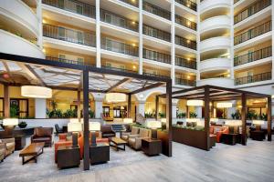 an image of the lobby of a hotel at Embassy Suites Dallas - Park Central Area in Dallas