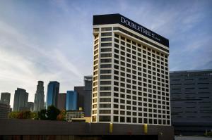 a building with a sign on the top of it at Doubletree by Hilton Los Angeles Downtown in Los Angeles