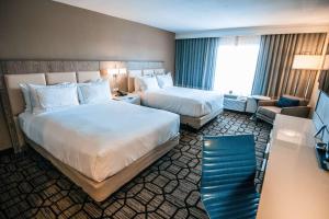Postel nebo postele na pokoji v ubytování Doubletree By Hilton Lubbock - University Area