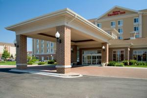 a hotel building with a large entry way at Hilton Garden Inn Chicago/Midway Airport in Chicago