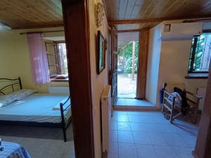 Postel nebo postele na pokoji v ubytování Archontiko Maros