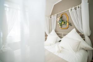Posteľ alebo postele v izbe v ubytovaní Room4Art Apartments Nr.6 in Center air-conditioned