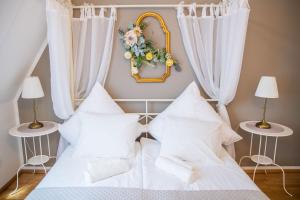 Posteľ alebo postele v izbe v ubytovaní Room4Art Apartments Nr.6 in Center air-conditioned